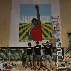 Foto Roma / La street artist Laika e il murales in memoria di Soumaila Sacko 1