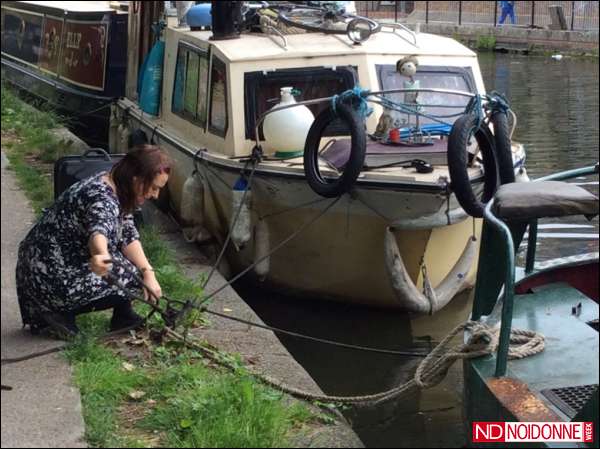 Foto: Boats-people con vista sulla City